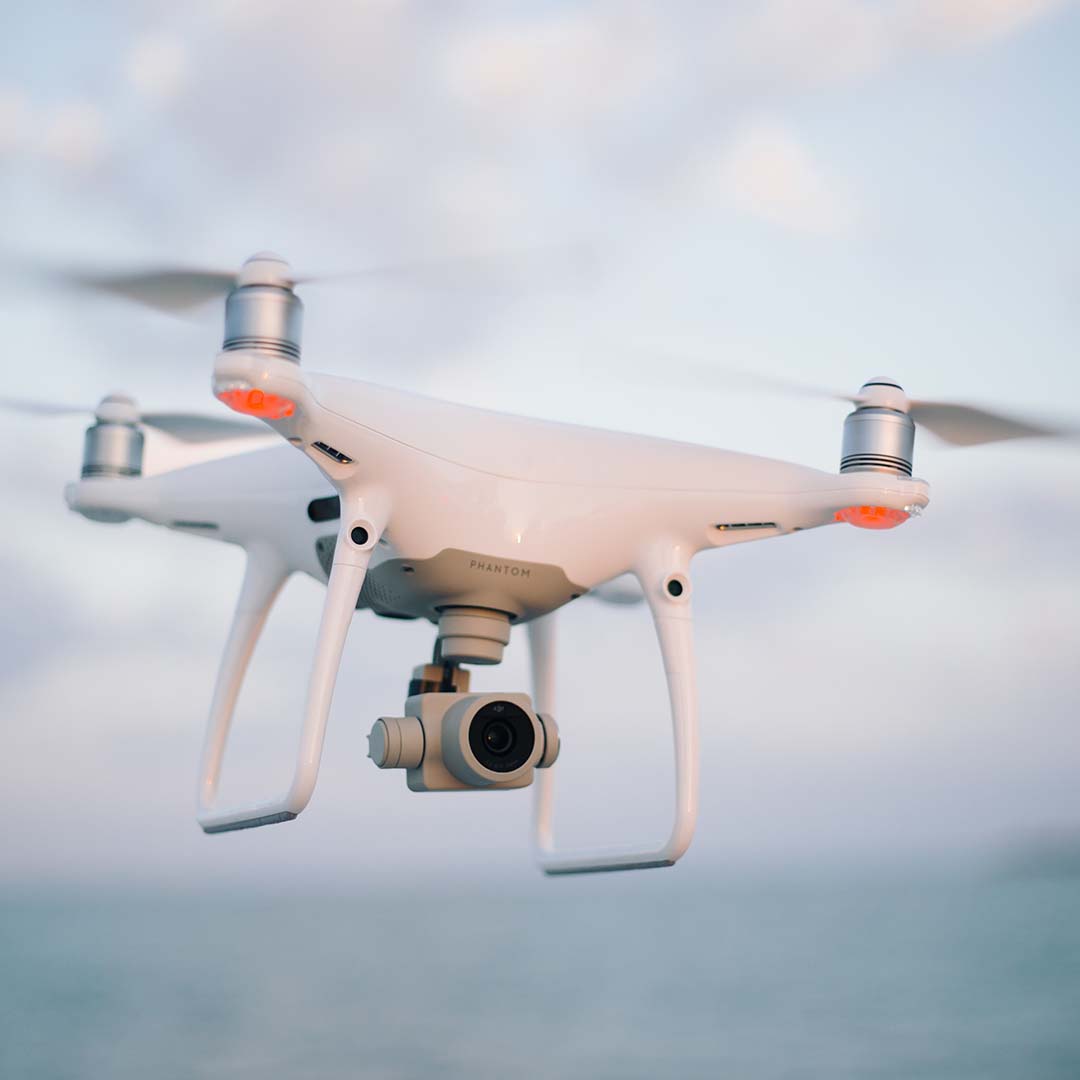 Drone flying over water