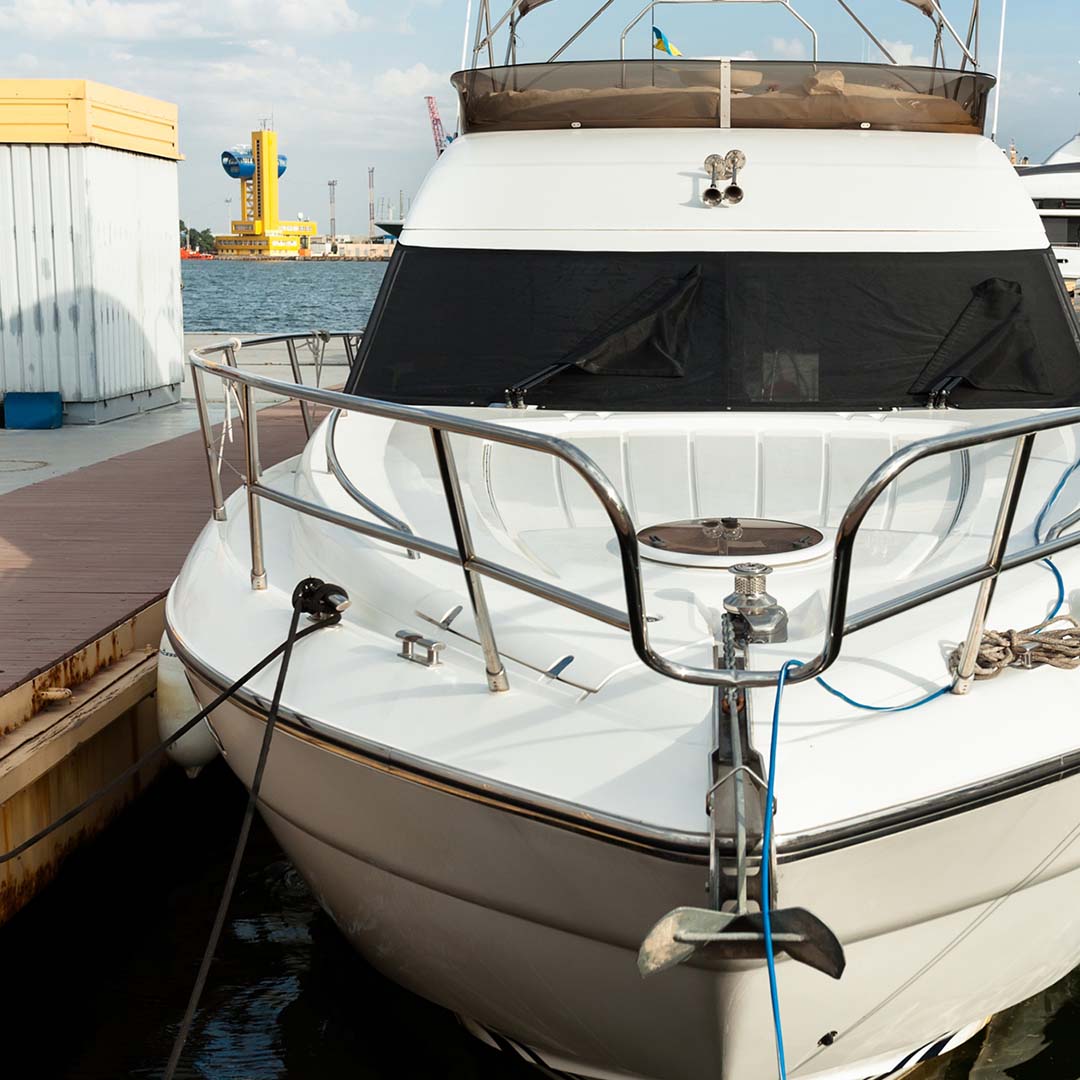 The front of a yacht parked at a dock
